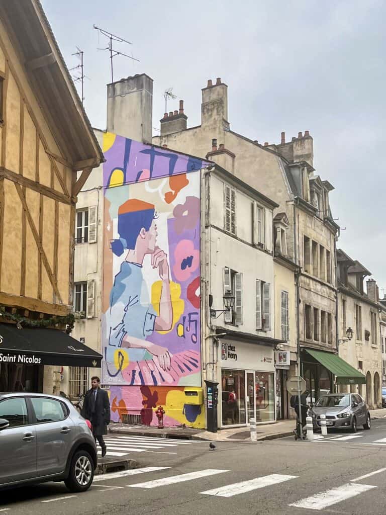 building in Dijon, France with hand painted mural