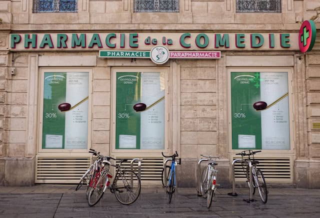 French pharmacy with bikes in front of it